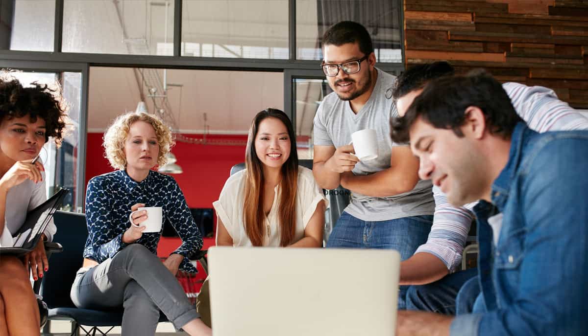 Group Meeting as Request Manager Couple looking at Employee Self-Service Portal by Crow Canyon Software