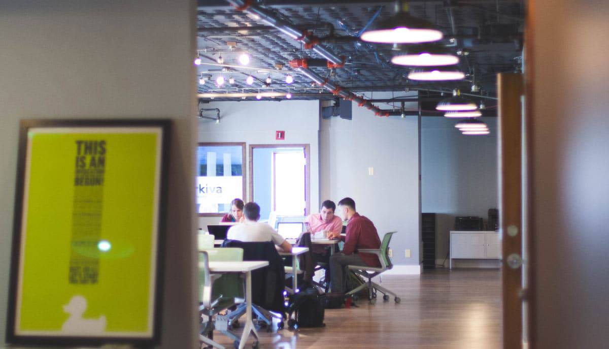 Office Life Couple looking at Employee Self-Service Portal by Crow Canyon Software