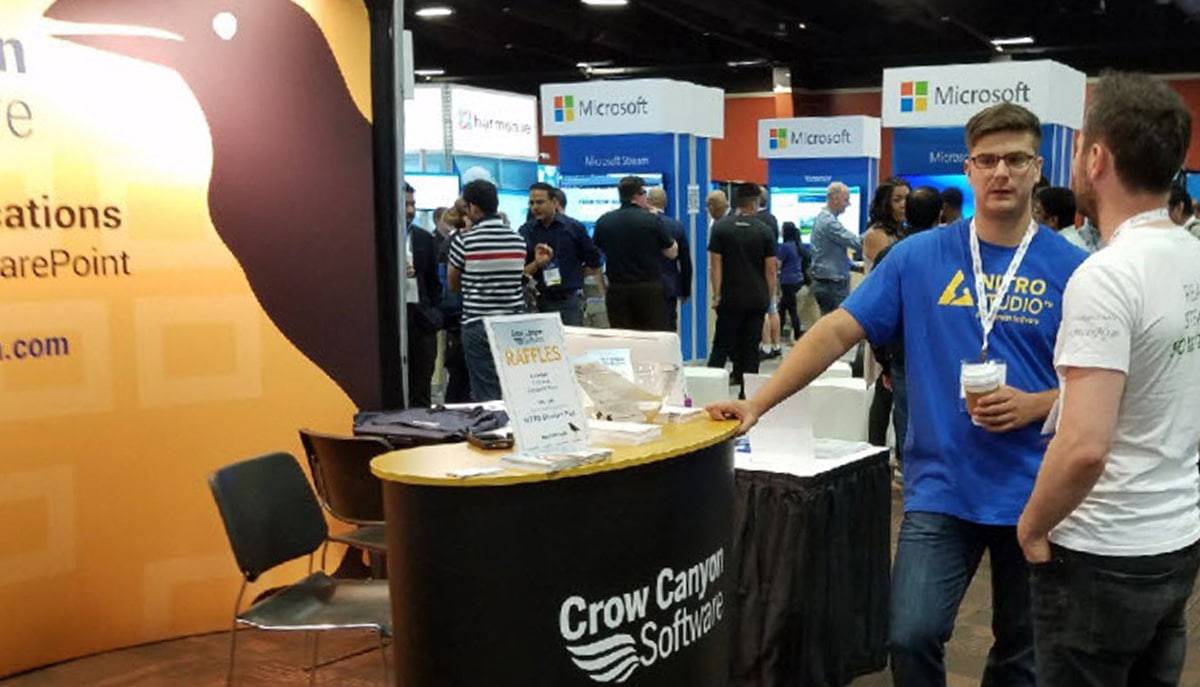 TradeShowImage Couple looking at Employee Self-Service Portal by Crow Canyon Software
